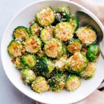 Bowl filled with crispy roasted Brussels sprouts.