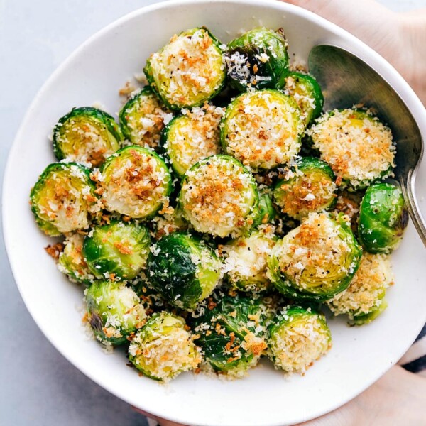 Bowl filled with crispy roasted Brussels sprouts.