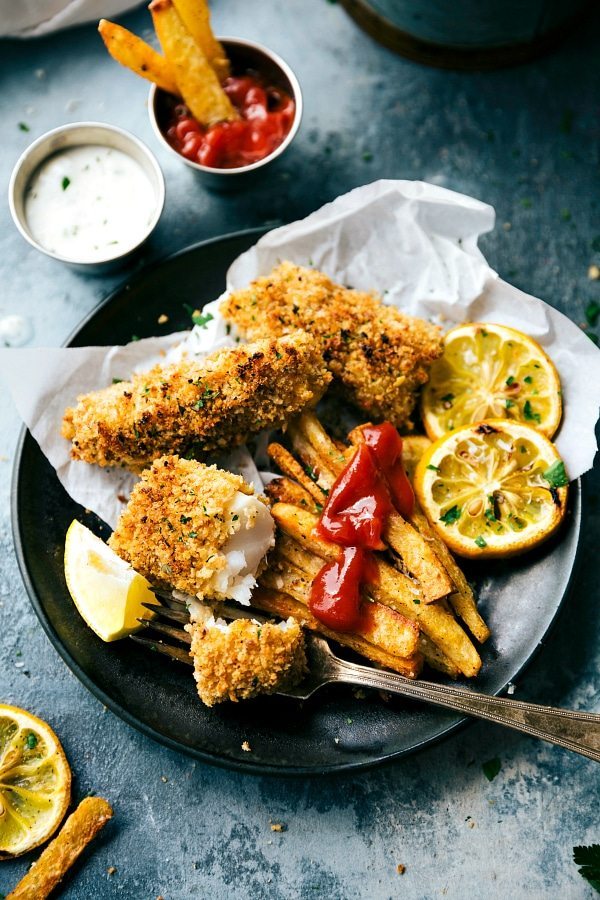 A quick and delicious take on fish and chips -- all baked on just ONE pan. This version is healthier because it isn't baked, but it certainly isn't lacking on flavor! The fries are ultra crispy and flavorful, the fish has a secret hack to make it seem fried, and all prep is done in under 30 minutes. Plus a quick homemade tartar sauce (optional to make) that takes no more than 5 minutes to assemble. From chelseasmessyapron.com