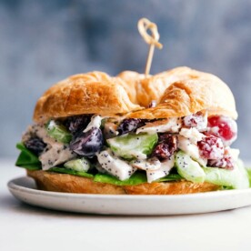 Healthy chicken salad sandwiched in a croissant, a wholesome meal ready to be enjoyed.