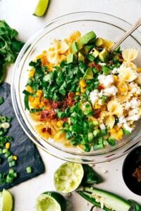 A delicious Mexican Street Corn Pasta salad with tons of veggies and a simple creamy dressing. Recipe from chelseasmessyapron.com