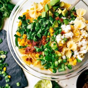 A delicious Mexican Street Corn Pasta salad with tons of veggies and a simple creamy dressing. Recipe from chelseasmessyapron.com