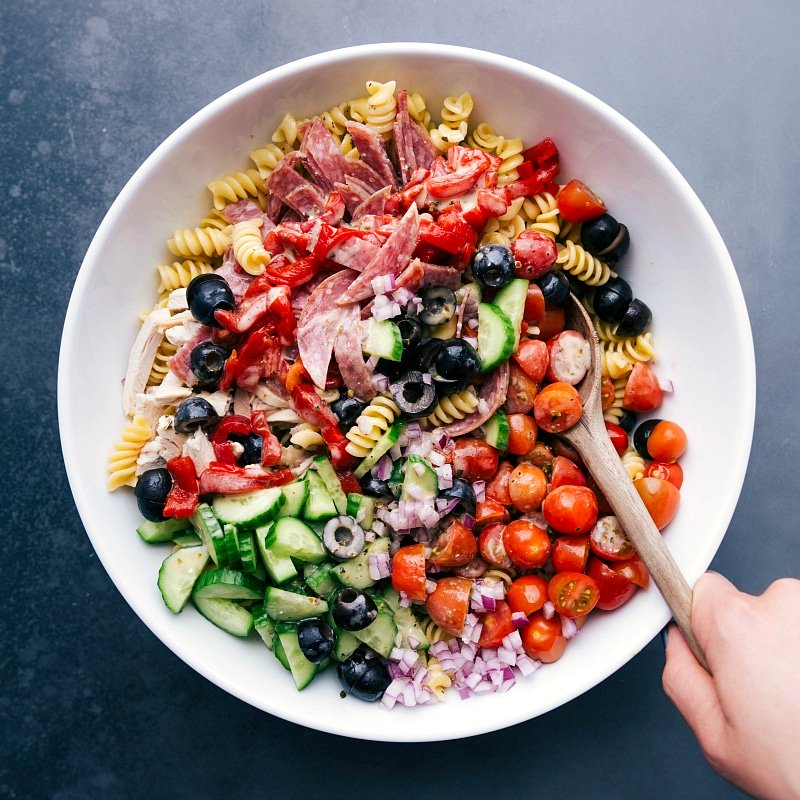 Ingredients being mixed together, forming a delicious and appetizing side dish.