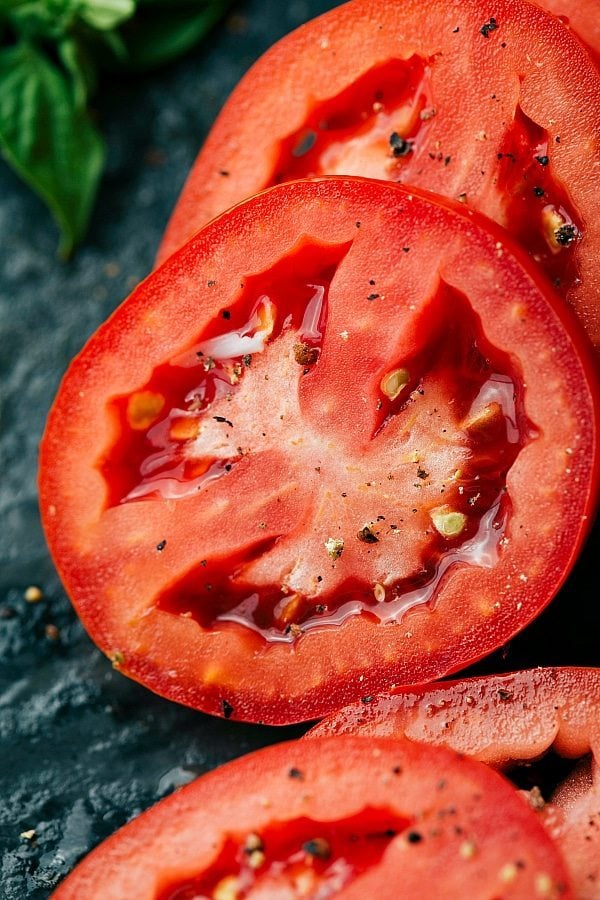 Sliced tomatoes that go into this Chicken Salad Wrap.