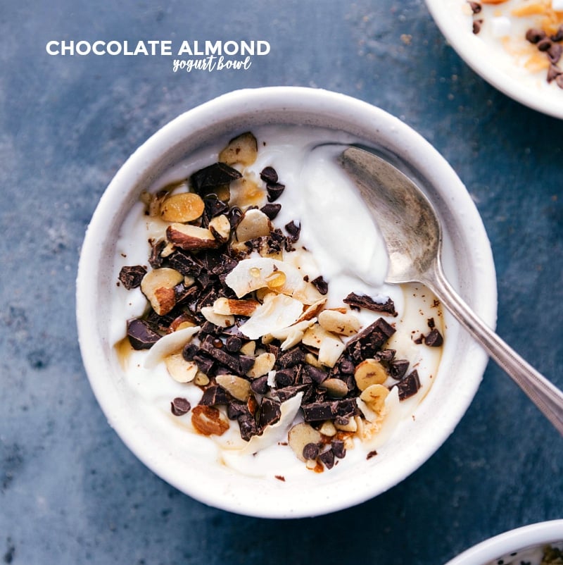 Overhead image of the chocolate-almond bowl with a spoon on it ready to be eaten.