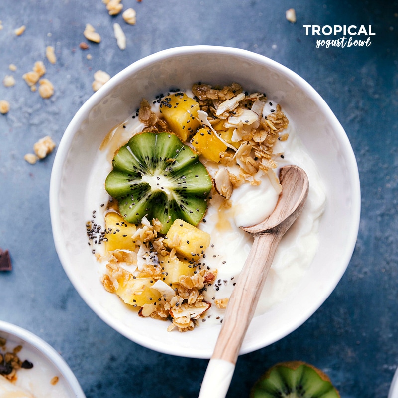 Overhead image of the bowl with fresh kiwi, pineapple, and granola on top.