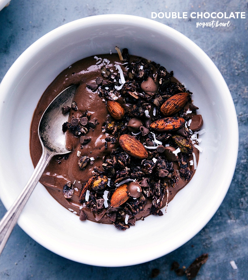 Overhead image of the double chocolate Yogurt Bowl with fresh granola on top ready to be eaten.