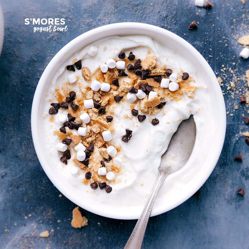 Overhead image of the s'mores yogurt with crumbled graham cracker, mini marshmallows, and mini chocolate chips ready to be eaten.