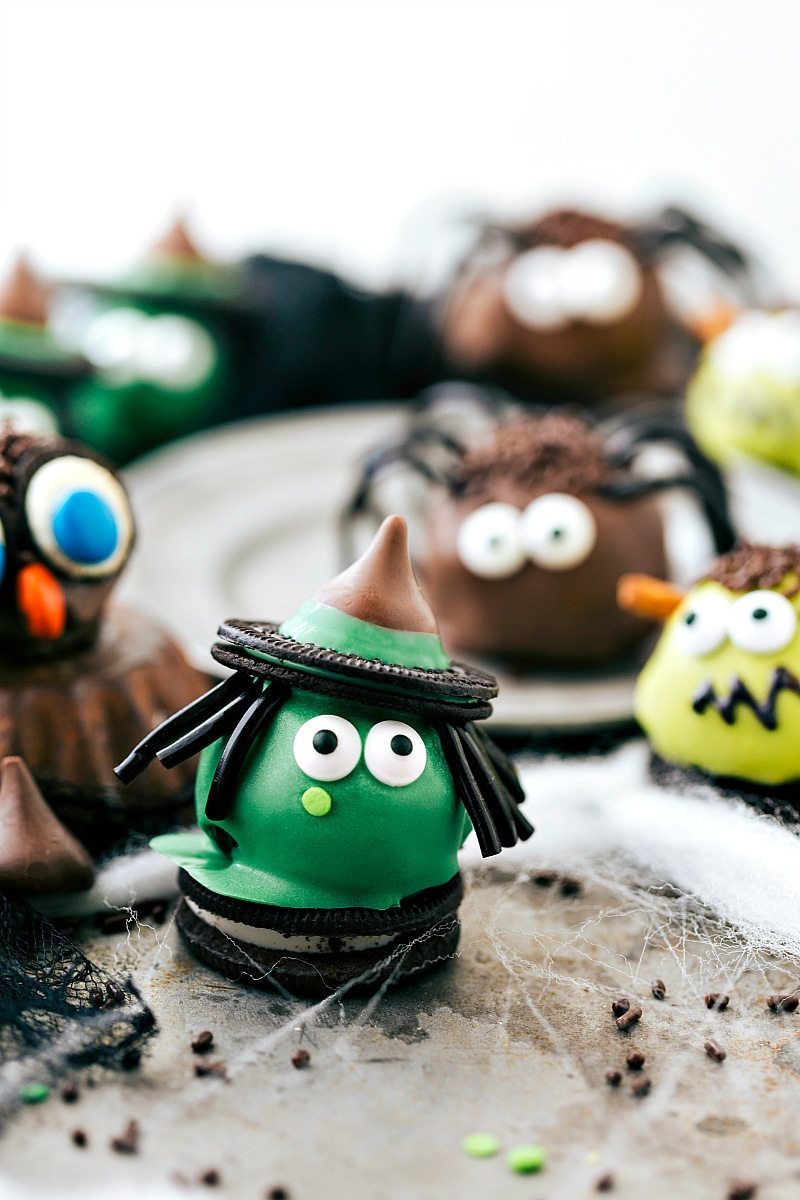 Four different ways to dress up an oreo ball for Halloween -- a witch, spider, frankenstein, and an owl. Easy and delicious treats that are perfect for a party! via chelseasmessyapron.com