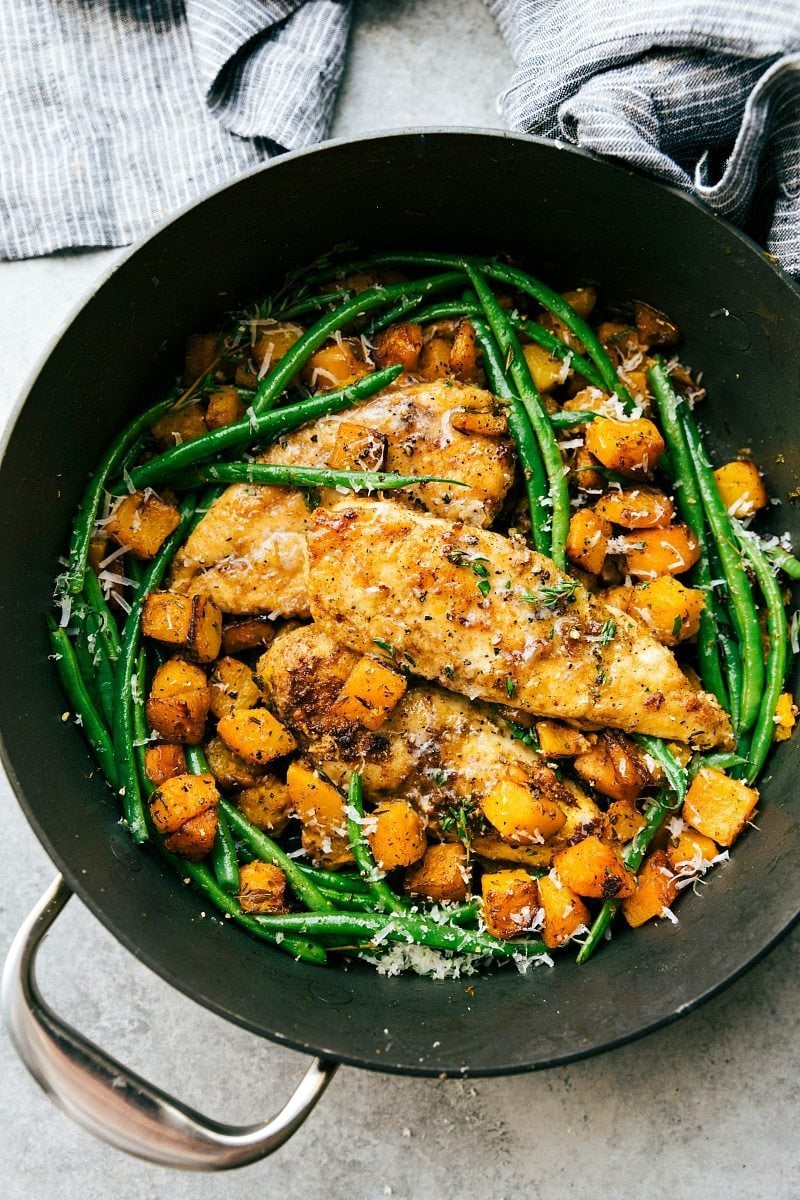 An EASY and delicious pan seared chicken, butternut squash, and green bean skillet dinner. An easy, family-friendly, 30-minute meal! via chelseasmessyapron.com