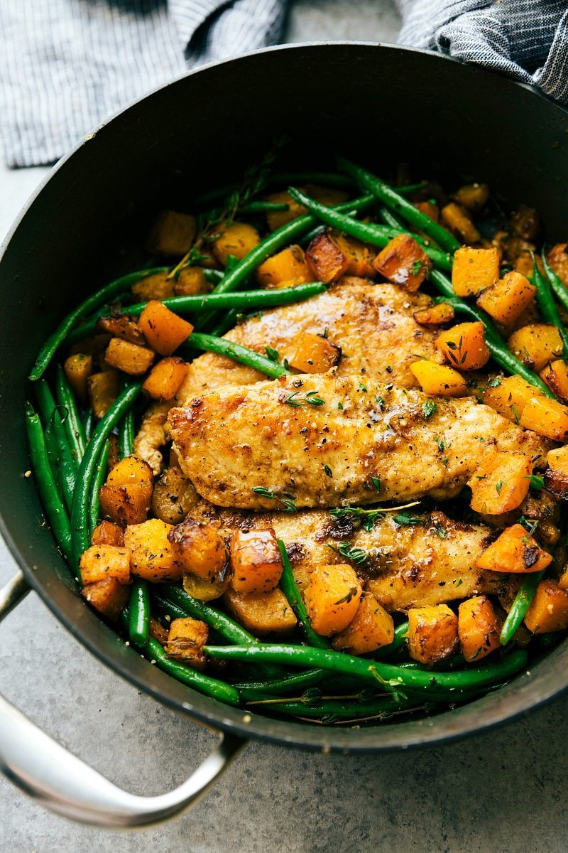 A delicious pan seared chicken, butternut squash, and green bean skillet dinner. An easy, family-friendly, 30-minute meal! via chelseasmessyapron.com