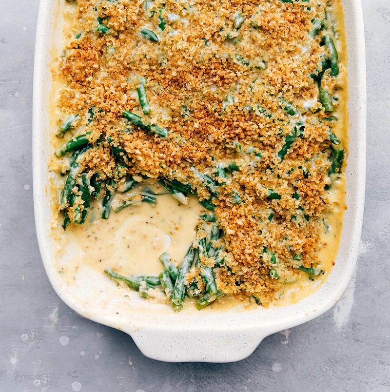 Image of the baked Green Bean Casserole with a scoop taken out of it.