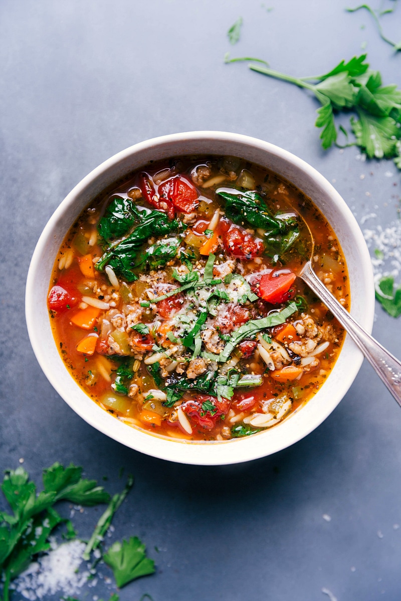 A bowl of the finished and warm italian sausage soup with orzo, a perfect comforting meal for a cold day.