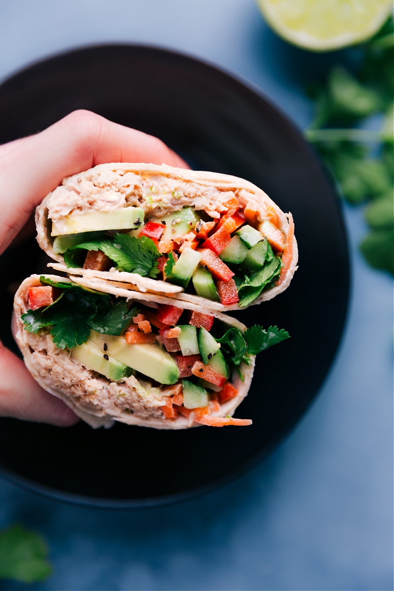 View of Tuna Salad Wrap, cut in half to show the filling.