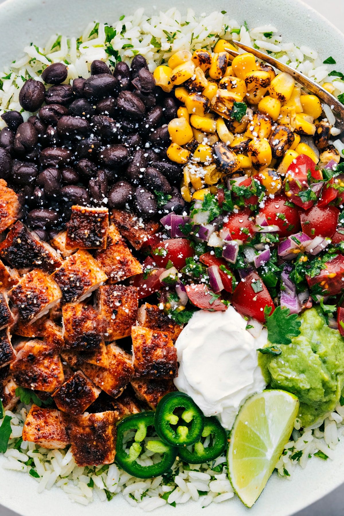 Chicken Burrito Bowls with all the toppings.