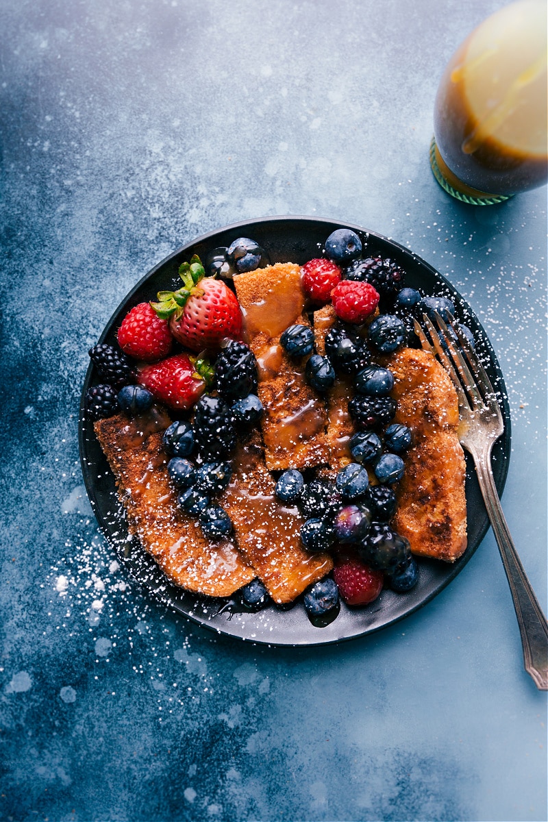 Cinnamon-sugar French Toast Sticks are dredged in an easy egg mixture and crushed Cinnamon Toast Crunch® cereal. This easy breakfast option is delicious, kid friendly, and easy to make! Recipe via chelseasmessyapron #breakfast #dessert #quick #easy #simple #berries #syrup #best #cinnamohn #Frenchtoast #sticks French Toast Sticks