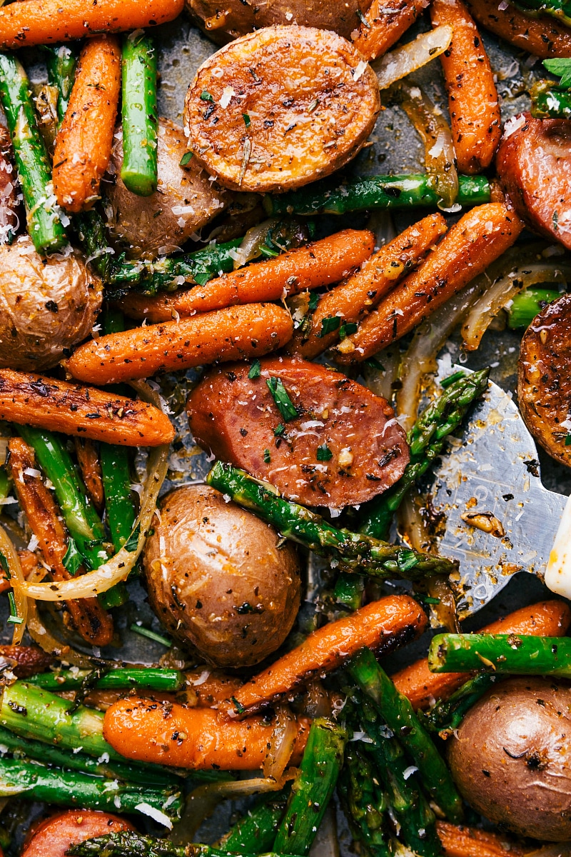 A mouthwatering assortment of vegetables, sausage, and spices in the finished one-pan potatoes and sausage dish, ready to be savored.