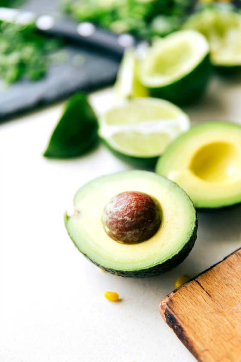 Image of a fresh avocado cut up that goes in this salsa