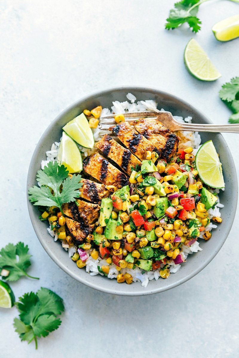 Overhead photo of grilled chicken with avocado salsa