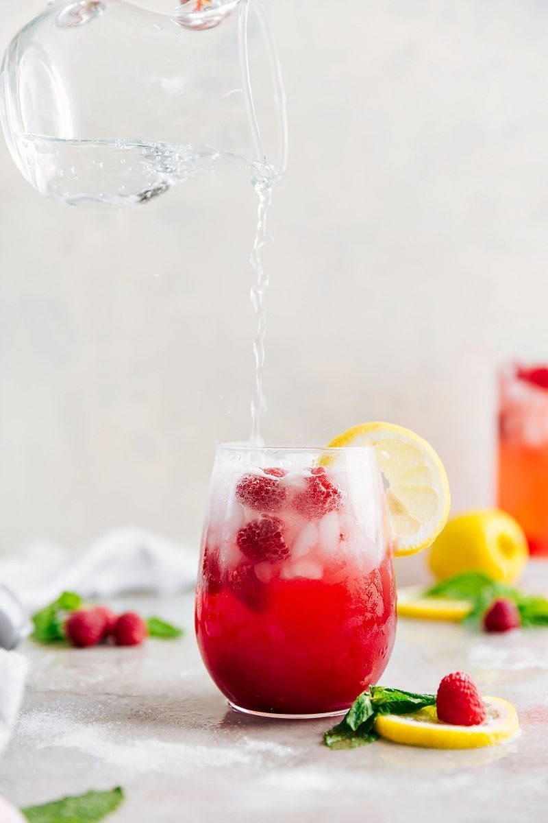 Image of the sprite being added to the homemade raspberry lemonade