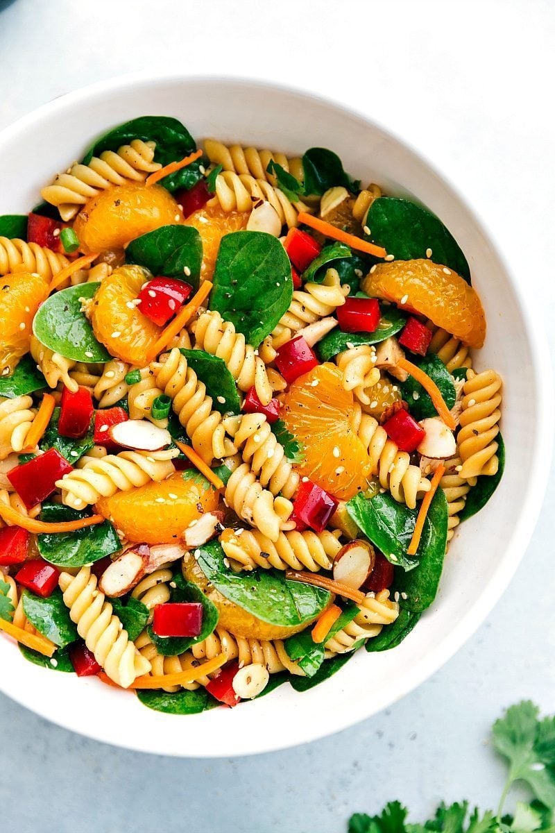 Asian pasta salad deliciously dressed with fresh mandarins and more.