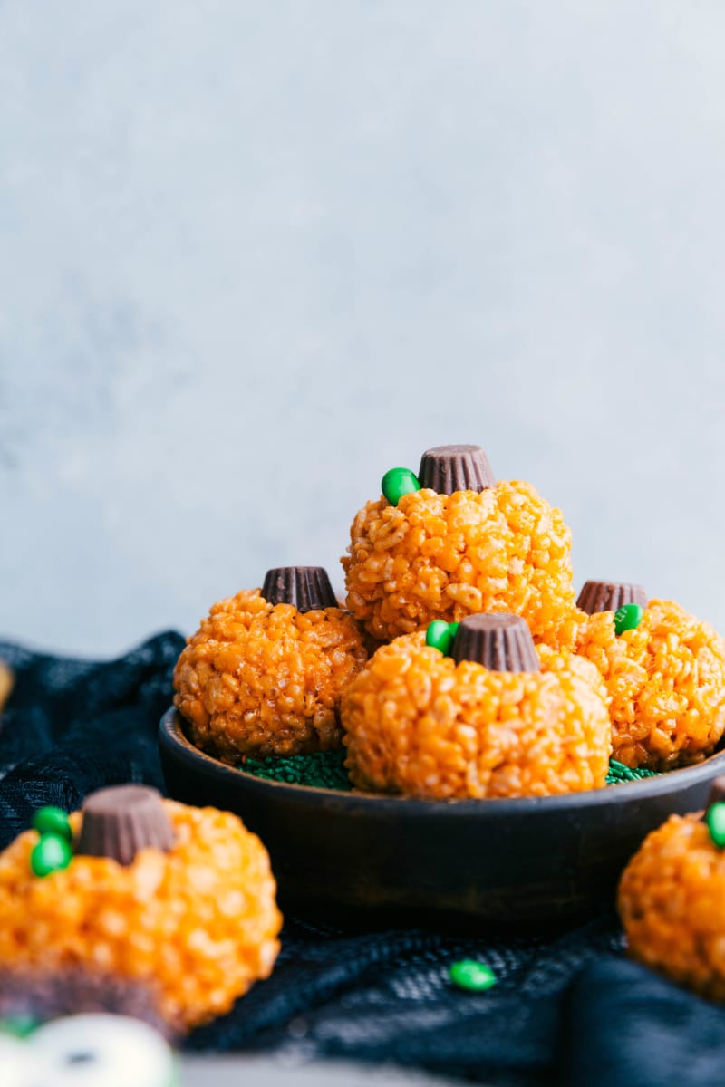 Image of the pumpkin krispies treats stacked on top of eachother, that go along with the other halloween rice krispie treats