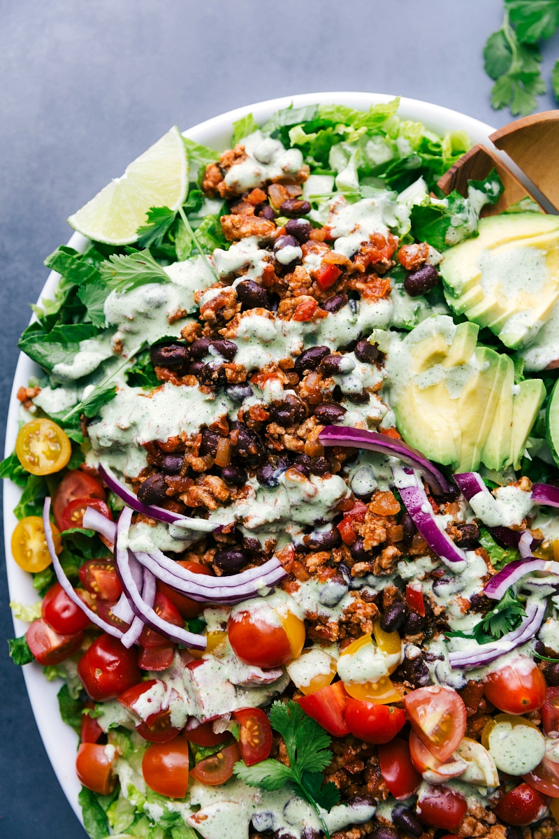 Vibrant and colorful turkey taco salad, fully dressed and ready to serve.