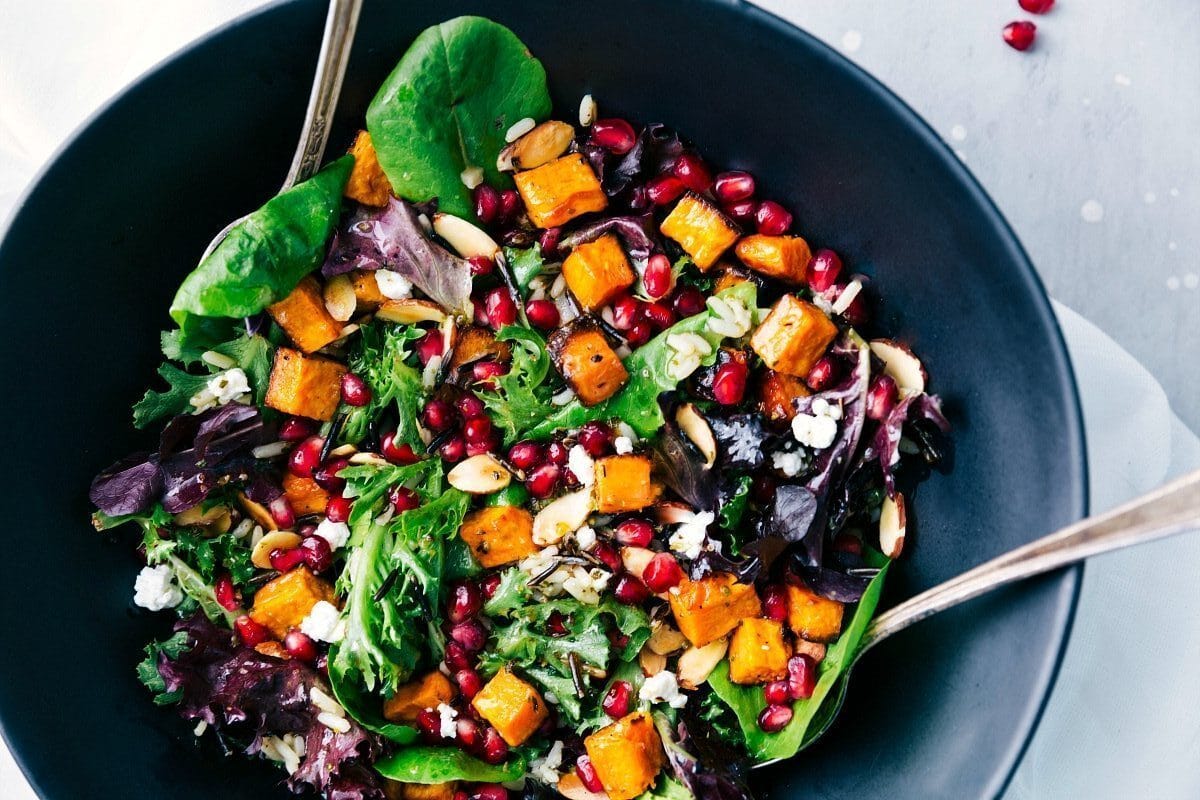 A bowl full of pomegranate salad.