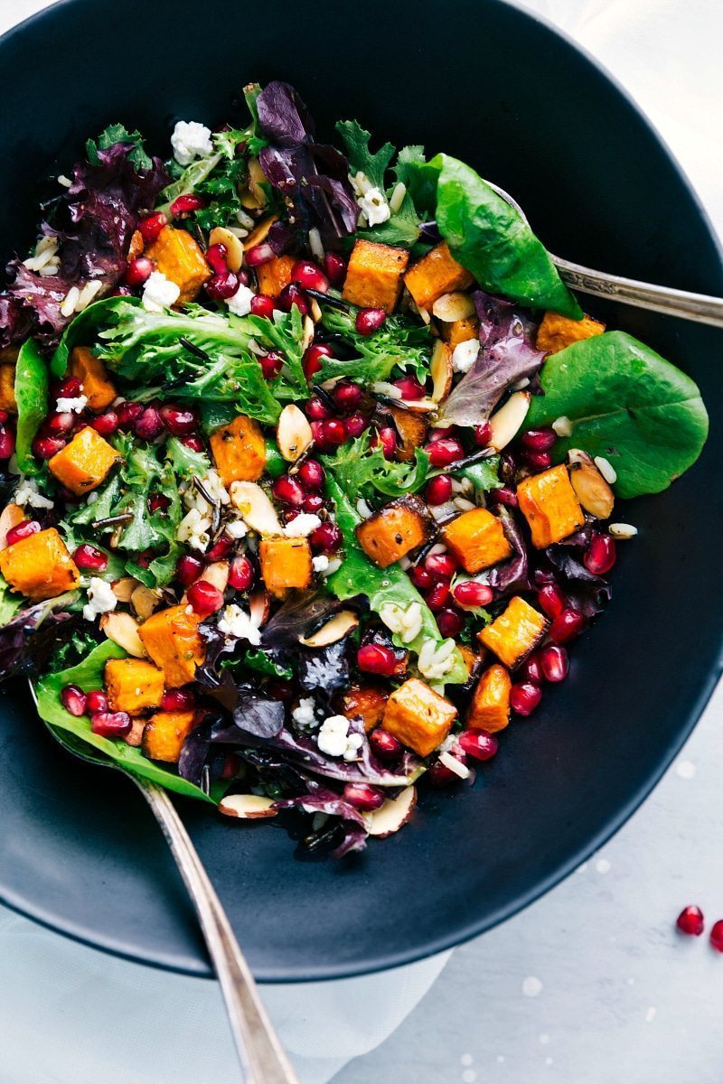 The BEST roasted sweet potato and wild rice salad | chelseasmessyapron.com | #sweetpotato #wildrice #salad #thanksgiving #fall #health #healthy #lemon #dressing #best #popular #easy #quick #pomegranate #almond #cheese #kidfriendly