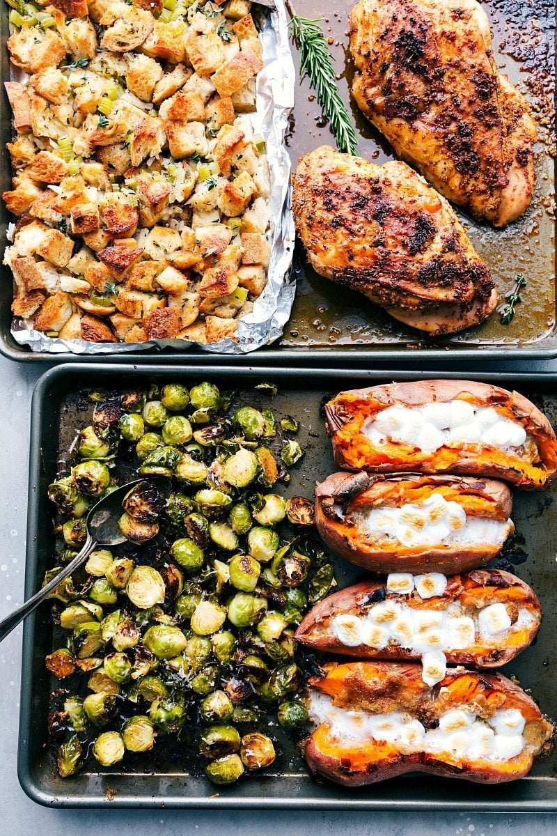 Process shots-- images of the stuffing, turkey, Brussel sprouts, and sweet potatoes cooked on two sheet pans.