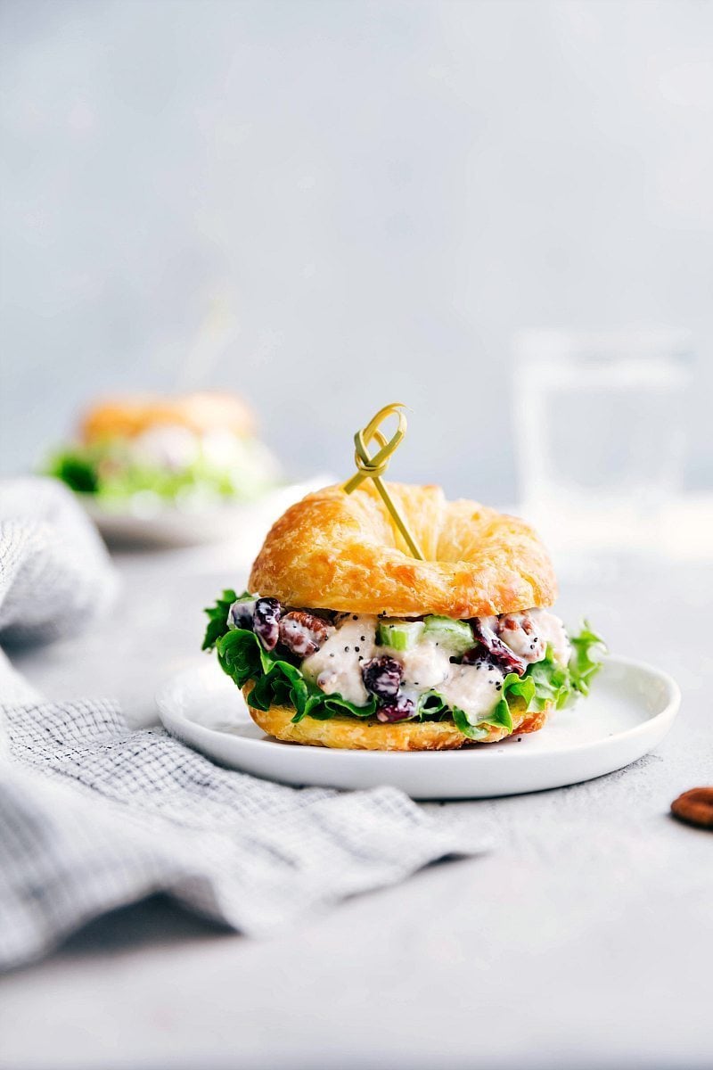 A chicken salad sandwich in a croissant