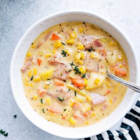 A hearty, inviting bowl of soup, steaming and ready to be enjoyed.