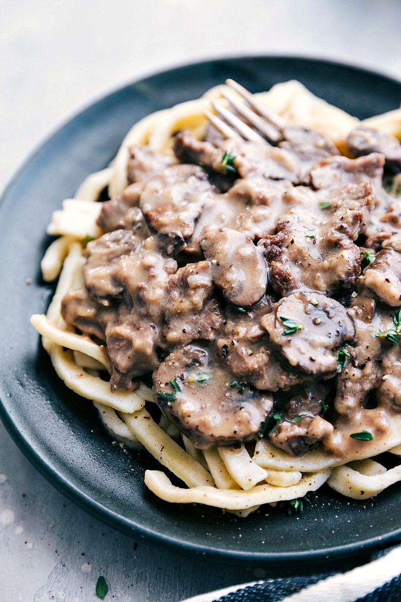Insanely good BEEF STROGANOFF made in the instant pot OR crockpot. Delicious and easy! via chelseasmessyapron.com | #instantpot #crockpot #slowcooker #beef #stroganoff #delicious #kidfriendly #dinner #quick #30minutes #beef #chuckroast #creamcheese #best #ever #noodles #egg