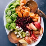 Winter Fruit Salad, compartmentalized, displaying a variety of fresh fruits.