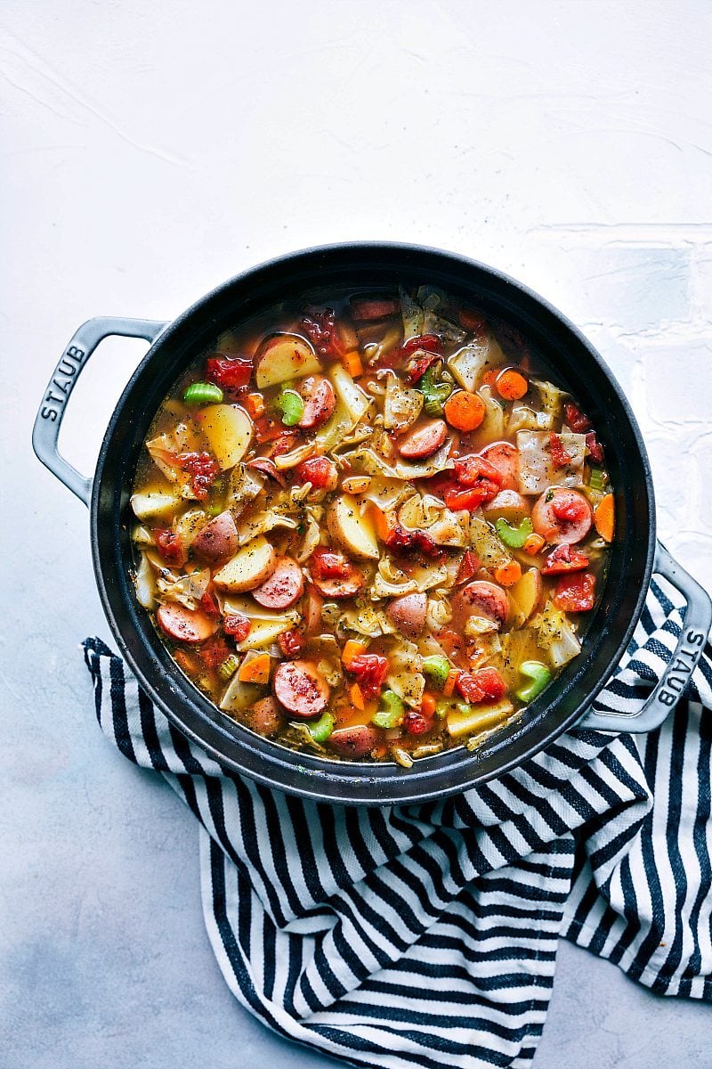 A thick and hearty sausage, potato, and cabbage soup; a healthy recipe that is packed with flavorful ingredients! chelseasmessyapron.com | #cabbage #soup #sausage #healthy #easy #quick #cabbagesoup #celery #carrots #potatoes