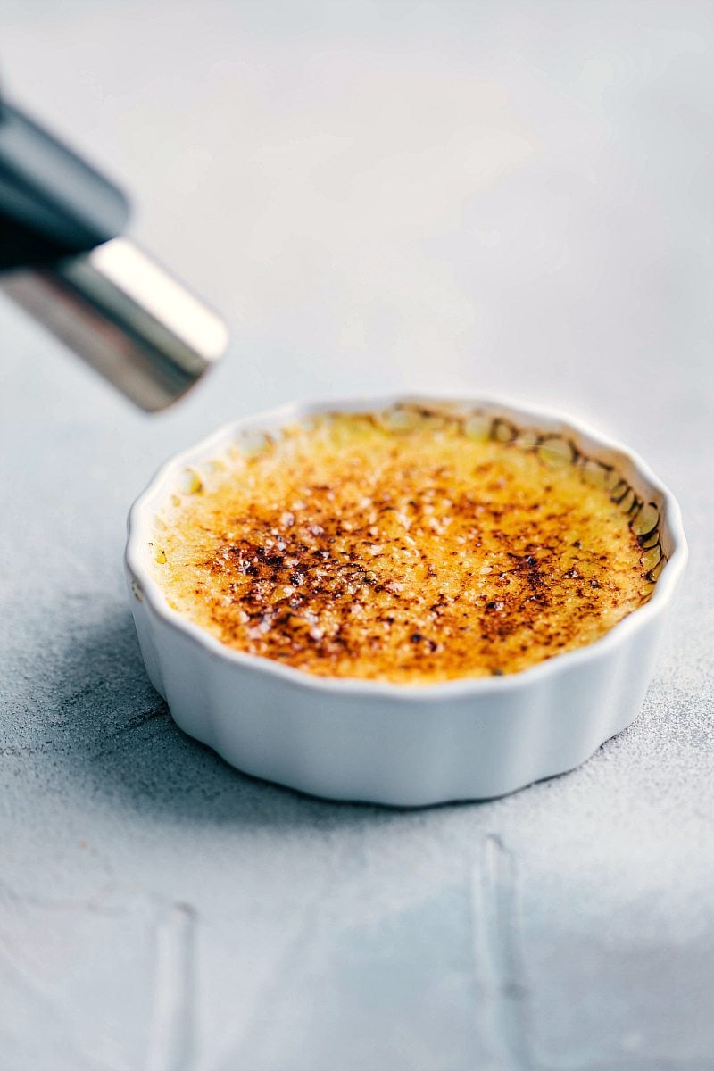 Use a torch to caramelize the sugar on top, resulting in a golden and crisp surface.