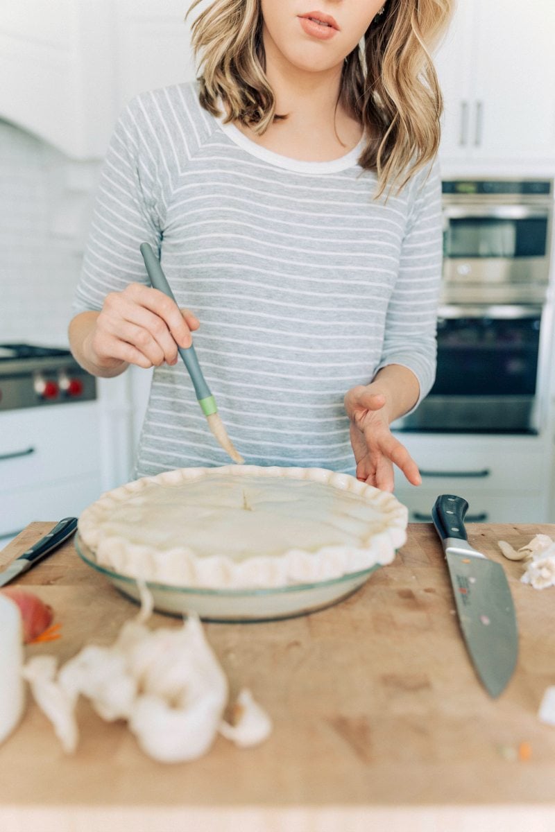 Doing the egg wash on the crust of this recipe.