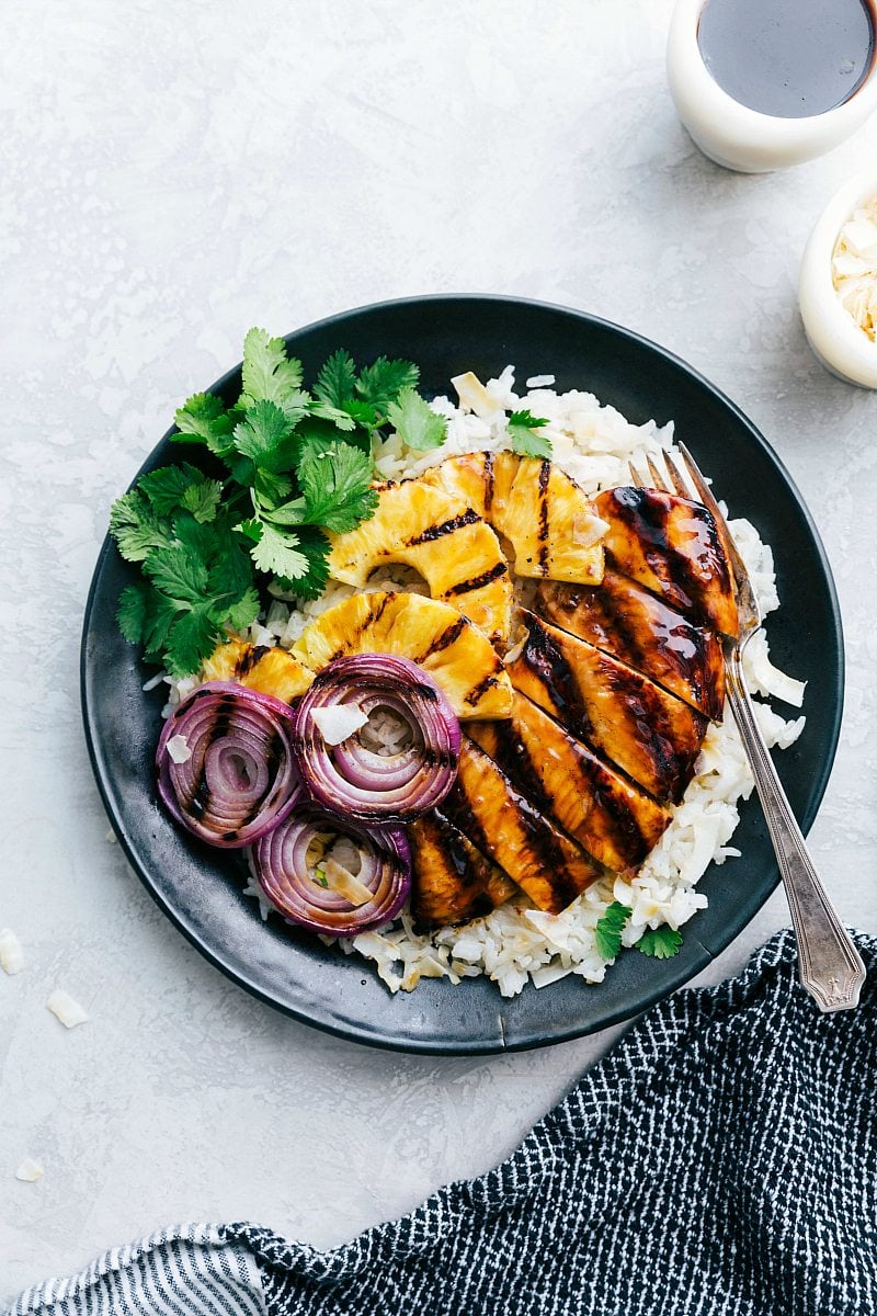 Grilled chicken teriyaki over a coconut rice with grilled pineapple and onion