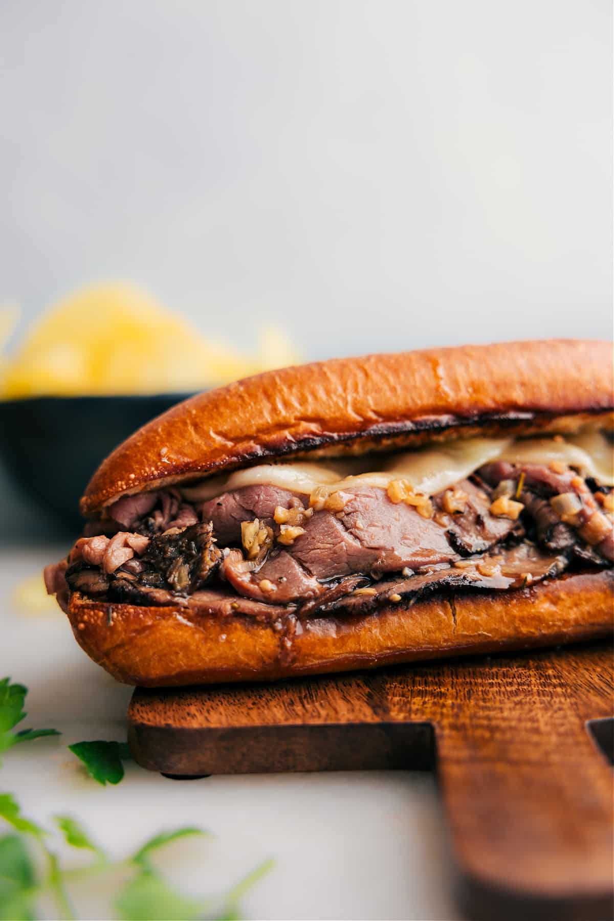 Meal Prep Taco Bowls French dip sandwich with tender beef and melted cheese served with au jus.