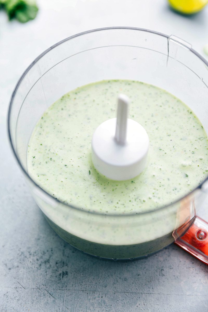 Close up photo of the cilantro lime sauce that goes with the burrito bowls