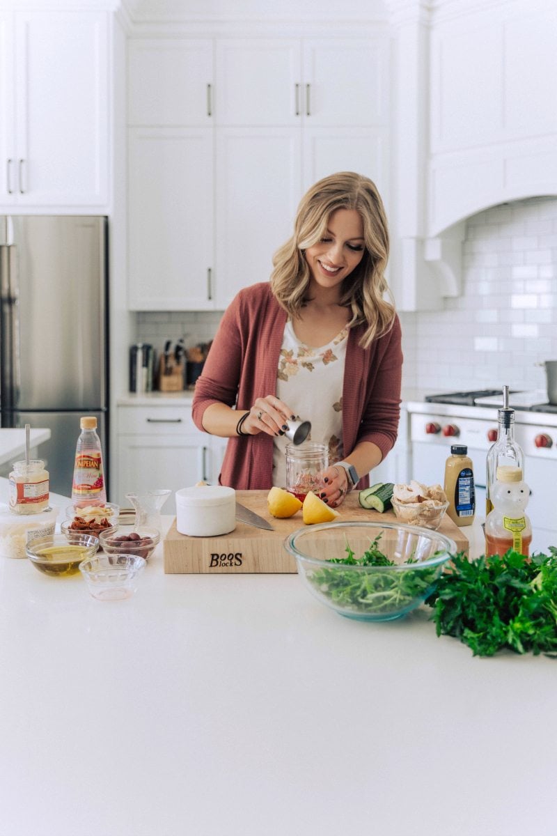 Chelsea making the dressing for this salad.