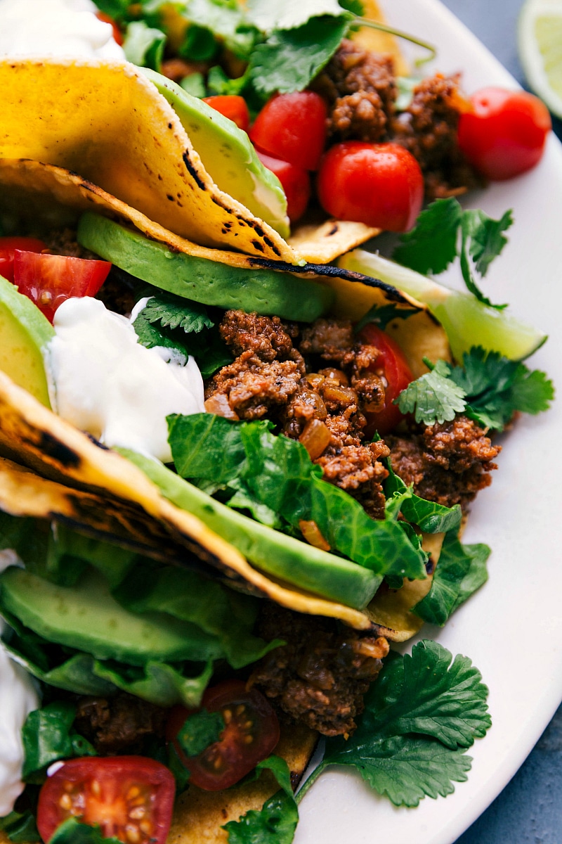 Up-close image of the best Turkey Taco recipe, on a plate with all the toppings on and ready to be eaten.