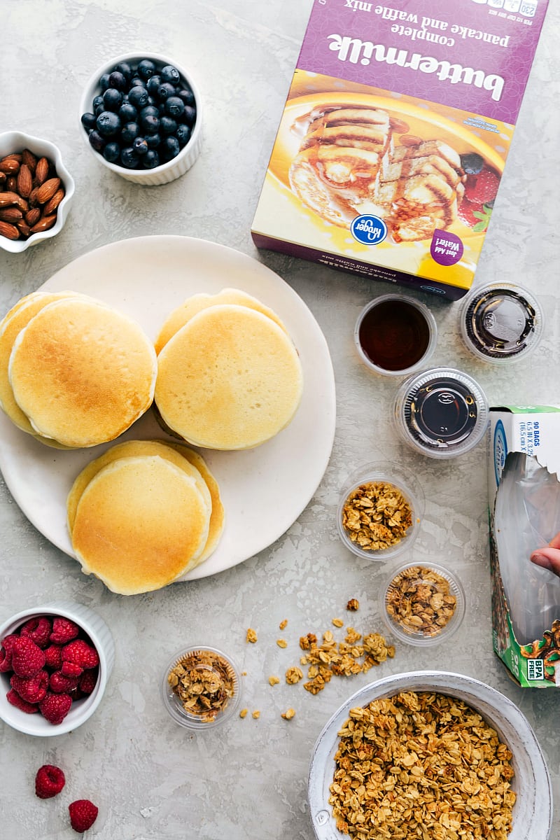 Overhead view of pancakes with toppings.