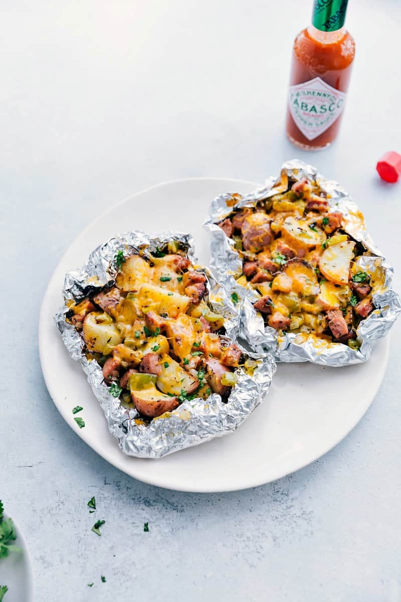 Sausage and Potato Foil Packs fresh off the grill ready to be enjoyed.