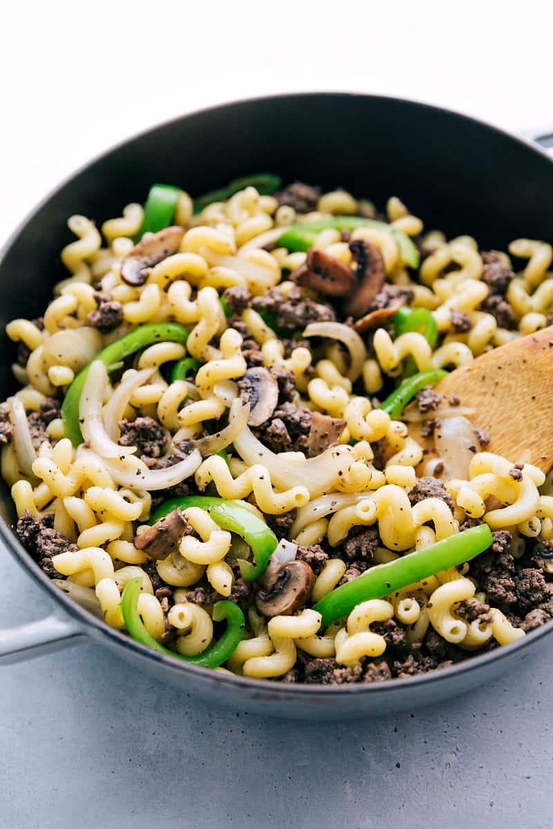 Up close skillet shot of the philly cheesesteak pasta without the cheese sauce added in