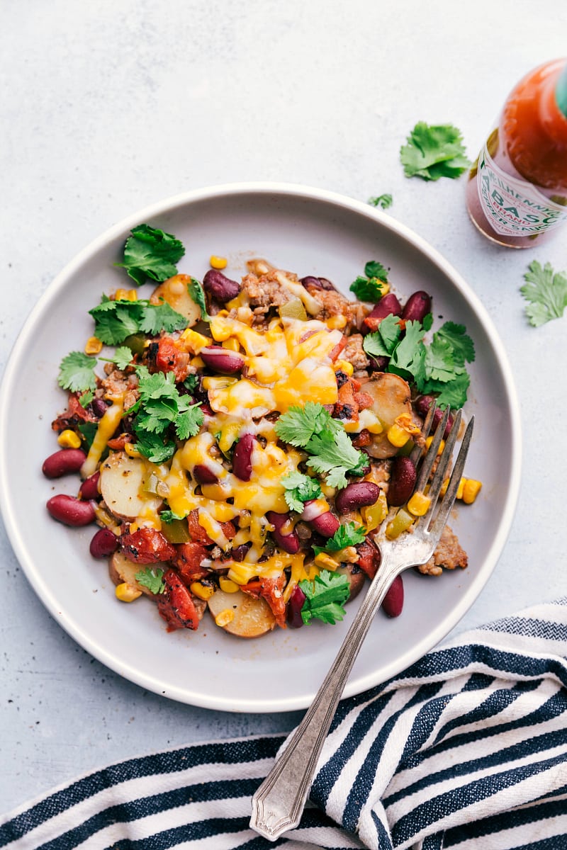 Crockpot Cowboy Casserole on a plate with lots of cheese.