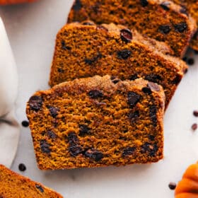 Moist and flavorful healthy pumpkin bread slices, packed with nutritious ingredients and fall spices.