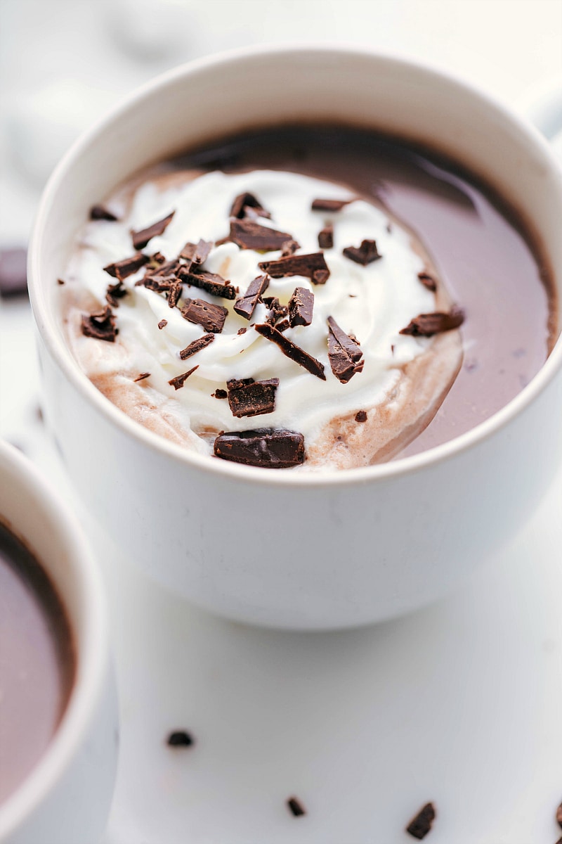 Hot Chocolate with melting whipped cream and chocolate shavings on top