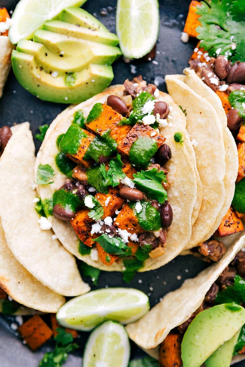 Vegetarian Tacos with garnishes and fresh cilantro-lime dressing