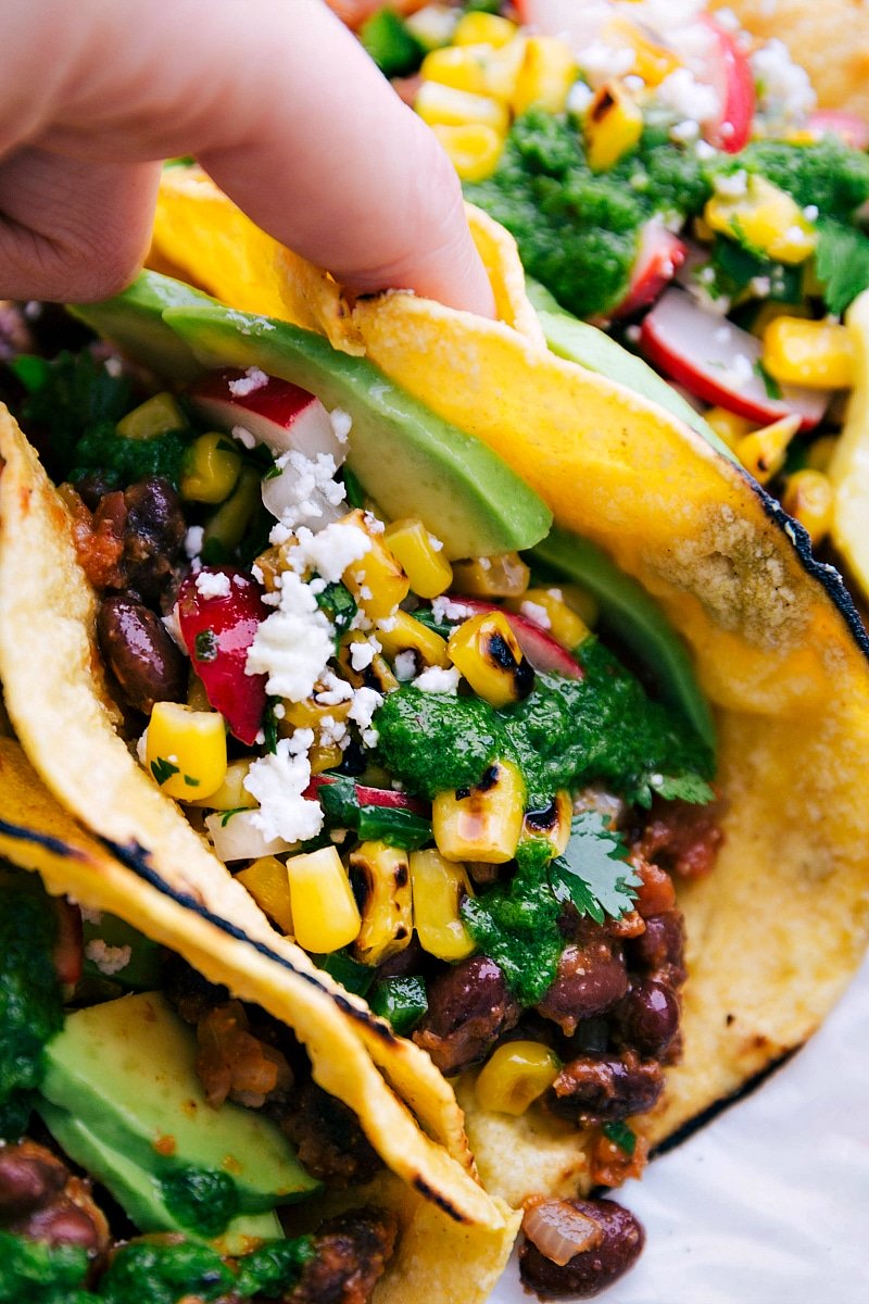Image of Healthy Tacos being picked up to eat.